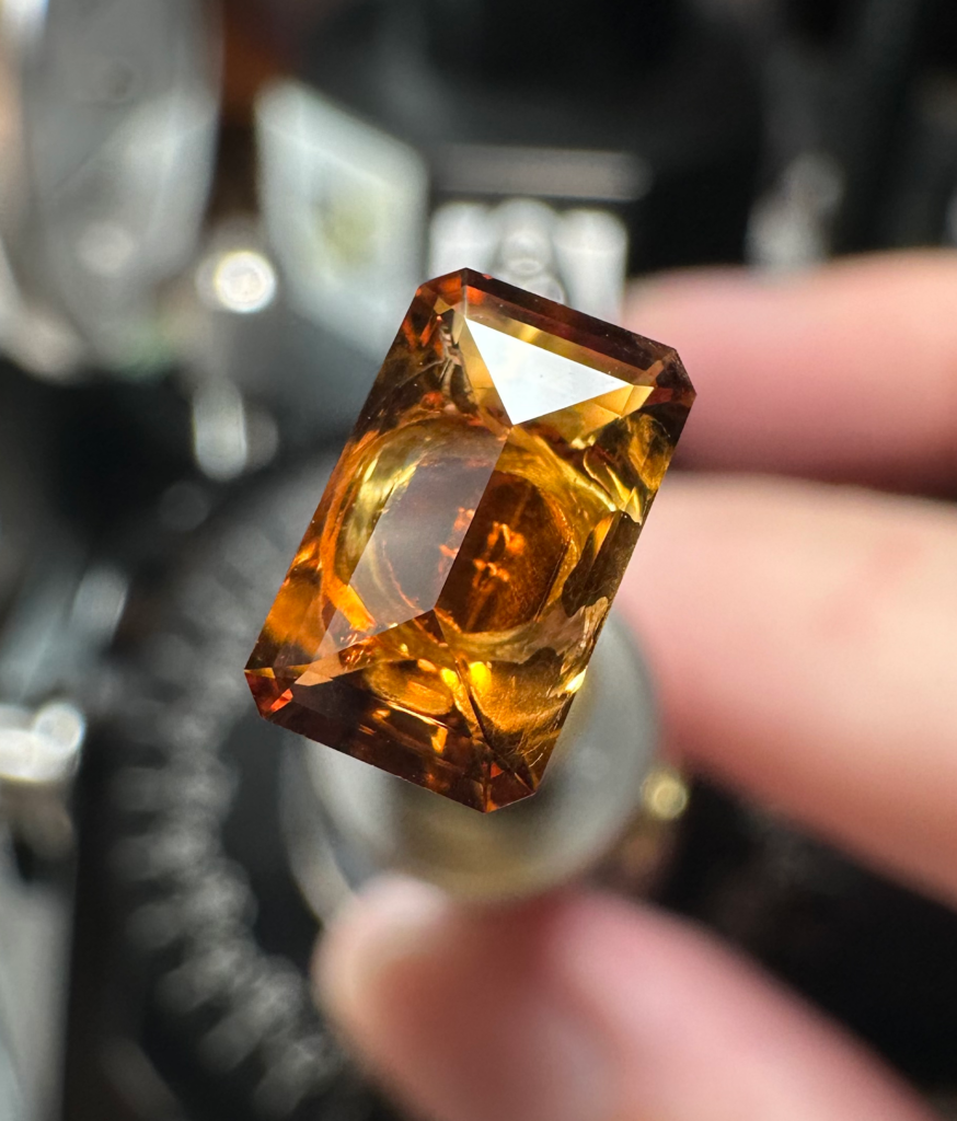 The crown of the Santa Ana Madeira Citrine "Golden Steps" Emerald Cut polished with Cerium Oxide right before the table is faceted and polished.