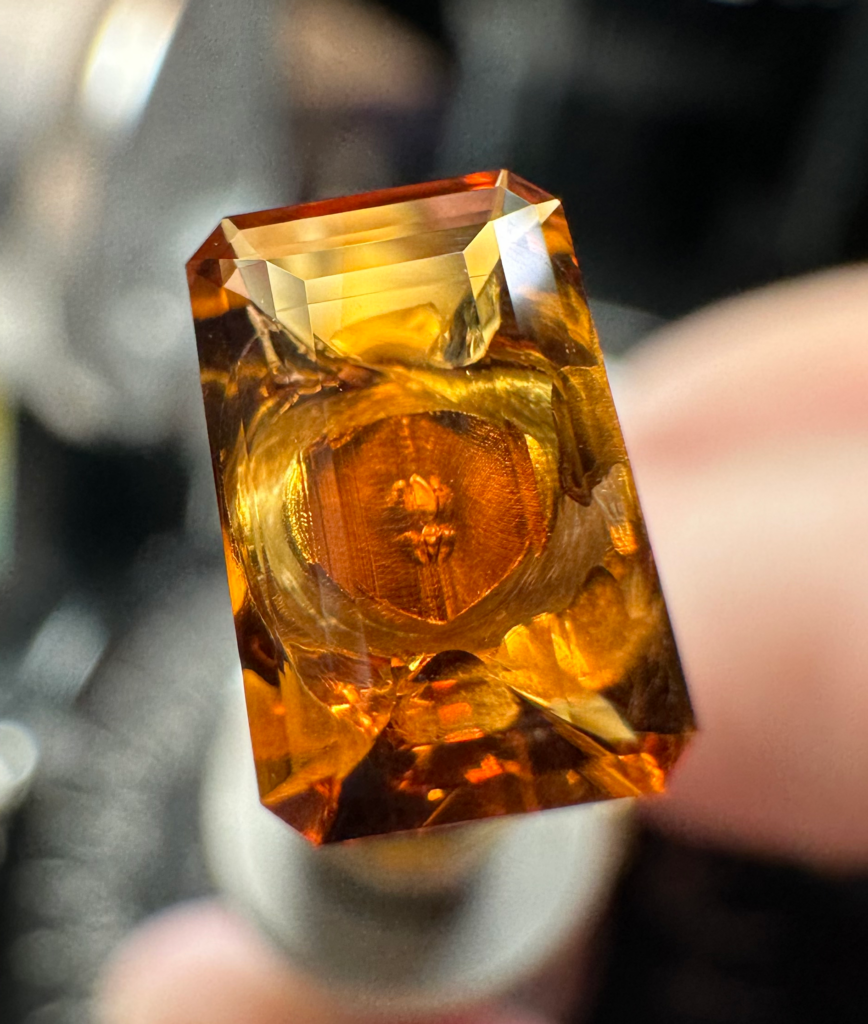With the table cut and polished, the Santa Ana Madeira Citrine "Golden Steps" gem is ready to be removed from the dop.